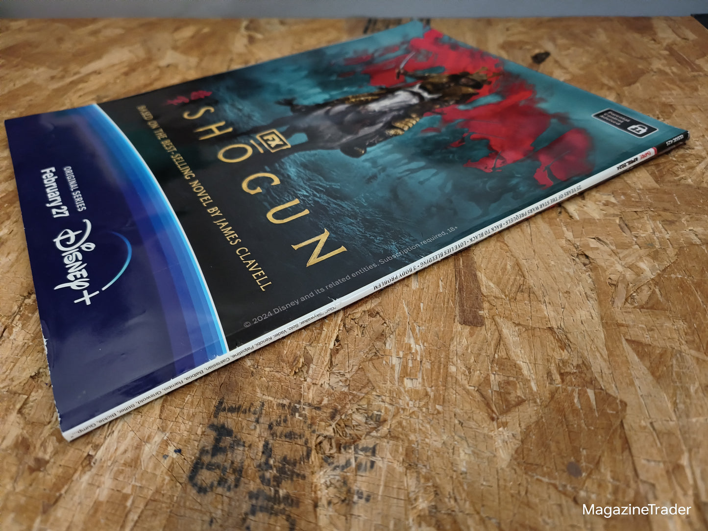 Book titled 'Shogun' on a wooden surface